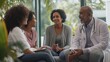 © Samady - A family discussing the importance of cancer screening and prevention during a wellness check-up