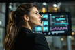 © JoeyMarut - polished female business speaker in black blazer, focused on data analysis, exuding confidence and professionalism in modern office environment