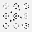 © Volodymyr - Abstract cross hairs. Crosshairs with bullet holes, vector.