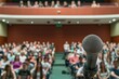 © Tee nuT - Public speaking event conference hall speech audience engagement front view communication skills for seo impact