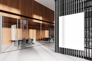 Poster - blank white poster mockup on a black and wooden wall in a modern office conference room with glass p