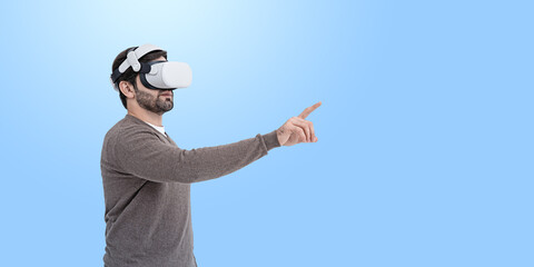 Aufkleber - man wearing vr headset pointing at something on blue background.