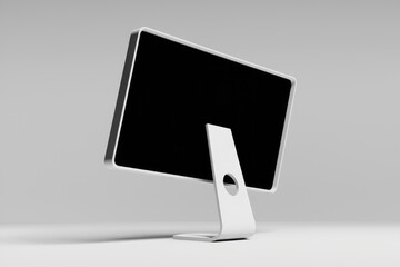 Poster - A white desktop computer with a black screen  angled to the right.