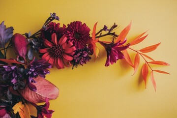 Aufkleber - Vibrant red and purple flowers with orange leaves on a yellow background