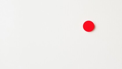 Poster - Single Red Dot on Bright White Background for Minimalist and Artistic Design Uses