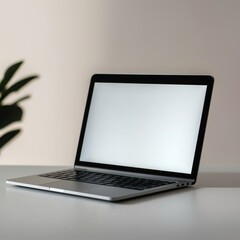 Poster - Sleek laptop sits on a clean desk against a plain background. Modern tech device. Pro workspace. Simple design. Empty screen. Suitable for presentations or work. Modern office setup. Minimalist style.