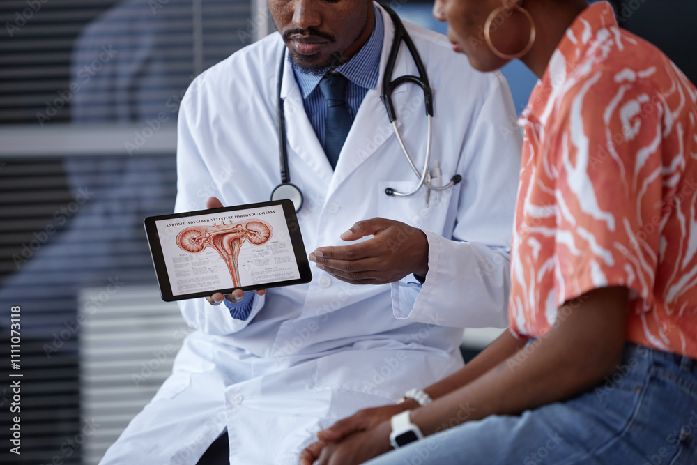 Cropped shot of African American male OBGYN wearing lab coat and ...