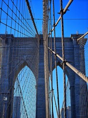  Close-up of Brooklyn Bridge Architecture with Steel Cables and Stone Pillars