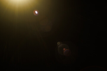 Aufkleber - Easy to add lens flare effects for overlay designs or screen blending mode to make high-quality images. Abstract sun burst, digital flare, iridescent glare over black background.