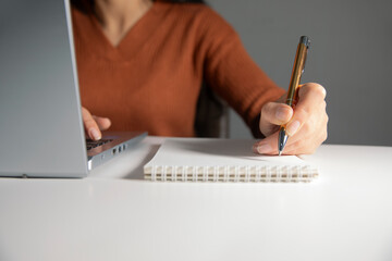 Poster - woman using a laptop at work, business concept