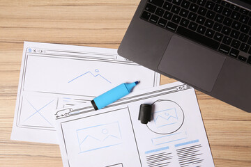 Leinwandbilder - Website development. Sketches of wireframes, highlighter and laptop on wooden table, flat lay