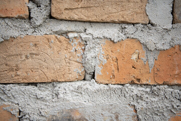 Weathered and textured brick wall background, Rustic and industrial-inspired interior design, Charming and cozy venue with natural elements.