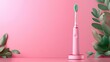 © Olya - Pink electric toothbrush with green bristles on stylish pink background