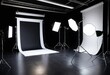 © Mainul - Professional photo studio setup with black and white backdrops, perfect for product photography.