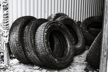 Poster - black and white photo of old car tires.