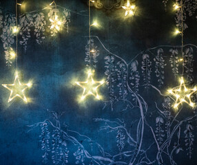 Wall Mural - christmas star lights on vintage blue wall