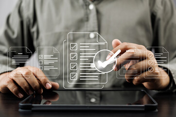 Canvas Print - Business performance monitoring and evaluation concept, Take an assessment, Business man using laptop and tablet online checklist survey, Filling out digital checklist, Questionnaire with checkboxes.