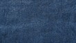 © Michel - Blue denim fabric background with a soft texture and detailed weave, perfect for fashion design projects.