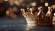 © Vuvimages - A close-up of a golden crown sitting on a sparkling surface with a blurred bokeh background, symbolizing elegance, power, and recognition within the royal context.
