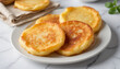 © Ekaterina - Crisp potato pancakes in close-up style in golden-brown hues for appetizing breakfast with copy space