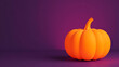 © fotoluigi868 - An orange pumpkin silhouette cutout stands out against a rich purple background in this stylish and creative Halloween design concept._00001_