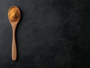 Aufkleber - Bright turmeric powder fills a wooden spoon, resting atop a dark slate surface, providing ideal space for food-related text and creative presentations