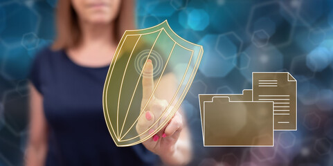 Wall Mural - Woman touching a data protection concept