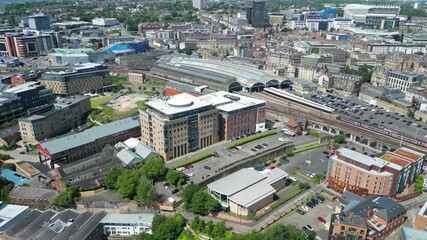 Wall Mural - Aerial View of Central Newcastle City from River Tyne at Northern England United Kingdom. July 19th, 2024, High Angle Drone's Camera Footage Was Captured from Medium High Altitude.