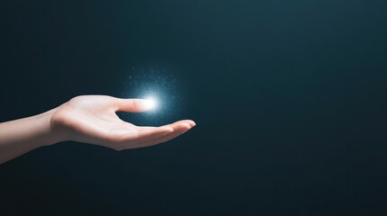Wall Mural - a hand extends with a glowing orb, symbolizing potential, creativity, and the magic of possibilities