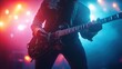 © milenialdesastudio - A guitarist performs on stage, illuminated by vibrant stage lights.