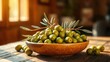 © sasiprapa - A wooden bowl filled with plump green olives, resting on a rustic wooden table, with a sprig of olive leaves reaching out, bathed in warm sunlight.