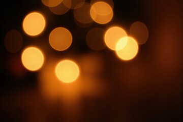 Wall Mural - warm soft bokeh lights creating a cozy abstract holiday atmosphere.
