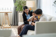 © SKW - Asian baby and families who have to work while raising children at home