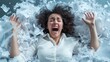 © Vuvimages - A woman in a white shirt yells while surrounded by a heap of paper, illustrating frustration or overwhelm. Her expression conveys strong emotions in a chaotic environment.