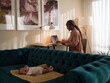 © Milles Studio/Stocksy - Candid woman working while baby is sleeping
