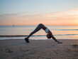 © Milles Studio/Stocksy - Woman doing yoga pose in front of the sea