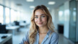 © LensMaster - Portrait of Smiling Woman with Long Brown Hair in Well-Lit Modern Interior Office