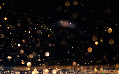 Wall Mural - shimmering dust particles create a magical atmosphere against a dark background
