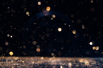 Wall Mural - shimmering dust particles create a magical atmosphere against a dark background