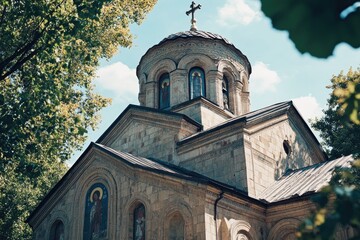 Aufkleber - A church with a prominent cross on its roof, in a serene environment