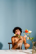 © valbar STUDIO/Stocksy - A young person poses confidently