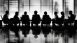 © Mutimul - Silhouetted Businesspeople Meeting In Modern Office