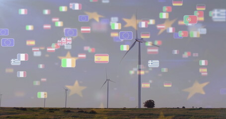 Poster - Wind turbines on landscape with floating country flags image