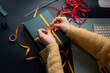 © Amor Burakova/Stocksy - Woman packing present
