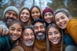 © Vadym - Large diverse family takes selfie outdoors. Happy faces show joy and togetherness. Family members of different ages and ethnicities. Group photo. Outdoor setting. Possible autumn or fall season.