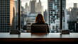 © Alexandra Adele - CEO sits confidently at a minimalist desk overlooking a city skyline during late afternoon