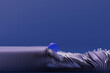 © Giada Canu/Stocksy - Blue reflective sphere on wave-like abstract structure with deep