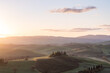© Elena Saurius & Dani Rex/Stocksy - Sunrise over the rolling hills of Val D'Orcia, Tuscany, Italy.