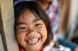 © Wicha Thawonsiri/Stocksy - Smiling Asian Girl in Rural Thailand
