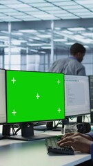 Poster - vertical video engineer using green screen computer in server room, developing disaster recovery pla